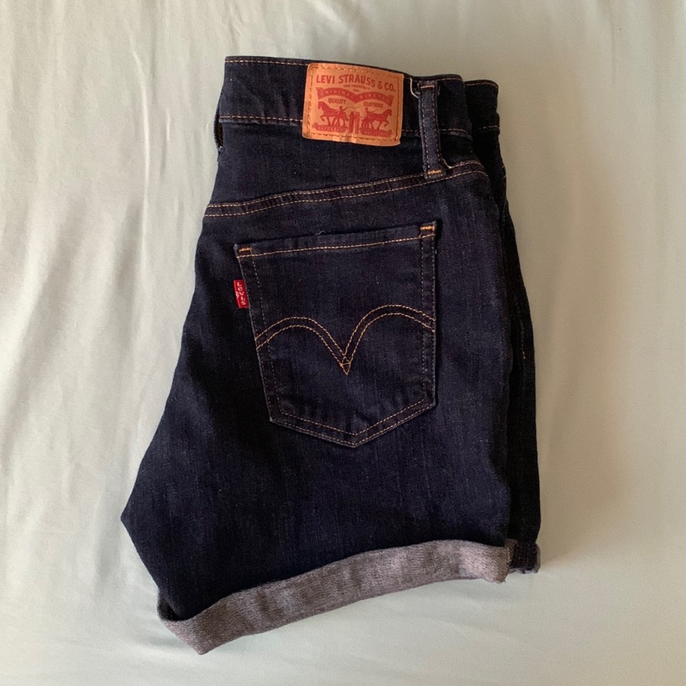 dark blue levi mid length shorts